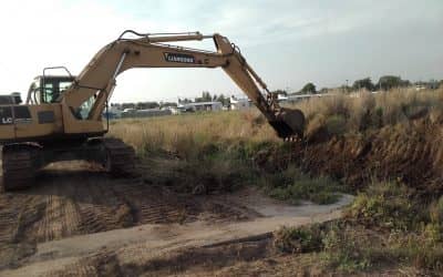 Limpieza en los canales pluviales de Berutti